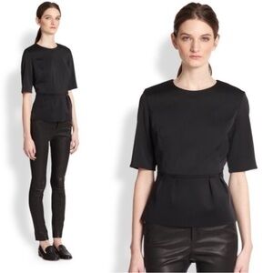 J Brand scuba peplum top in black. Size small.